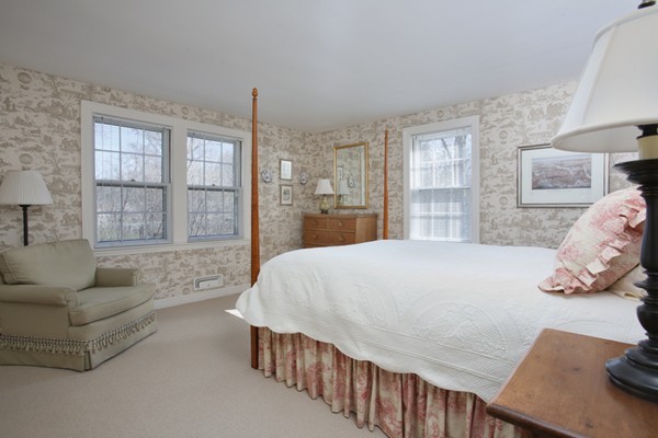 25 Columbine Road Weston, MA 02493 - Photo 9 of 11 a bedroom with a bed and glass window