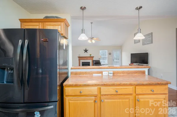 a bed room with furniture and a chandelier