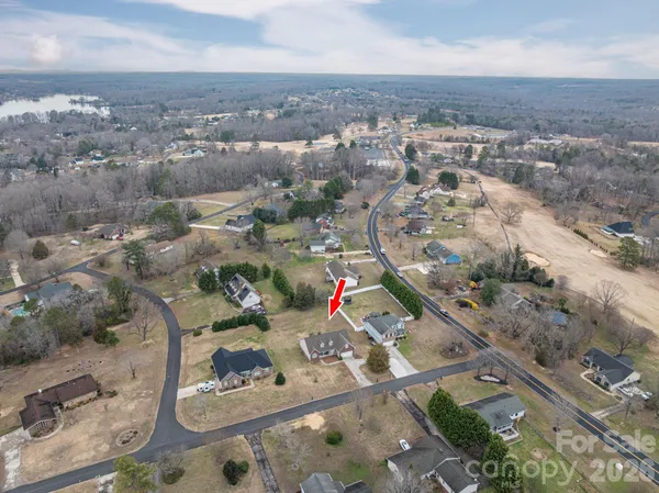 an aerial view of a highlighted house