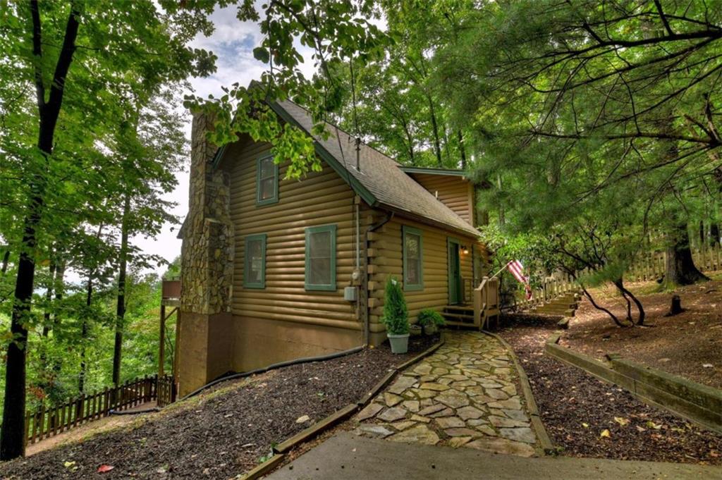 424 Walnut Ridge Ellijay, GA 30536 - Photo 1 of 1 a backyard of a house with lots of green space