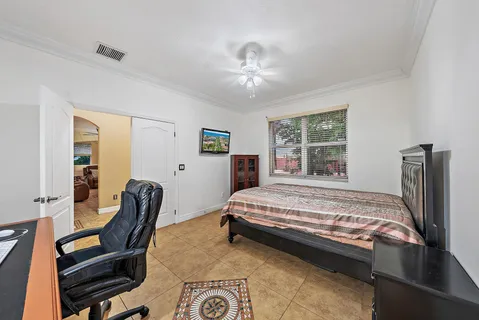 a bedroom with a bed and furniture