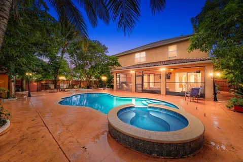 a view of outdoor space swimming pool and furniture