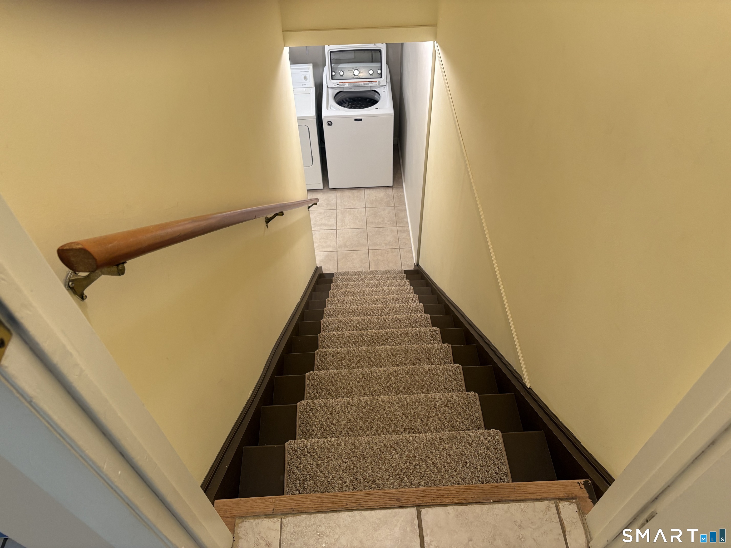 229 Branford Road, Unit 528 North Branford, CT 06471 - Photo 23 of 30 Stairway From Kitchen To Lower Level
