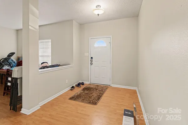 a bedroom with a bed and a table