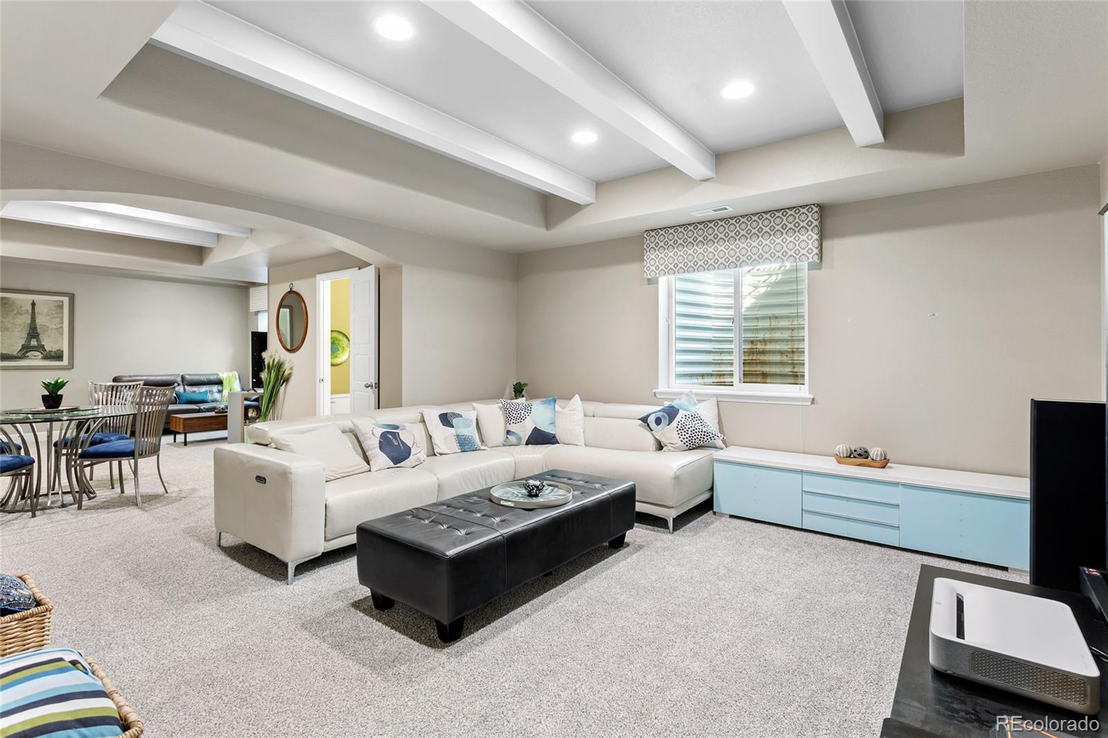 1444 Sidewinder Circle Castle Rock, CO 80108 - Photo 25 of 40 a living room with furniture and a window