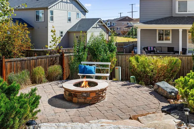 a view of an house with backyard space and garden