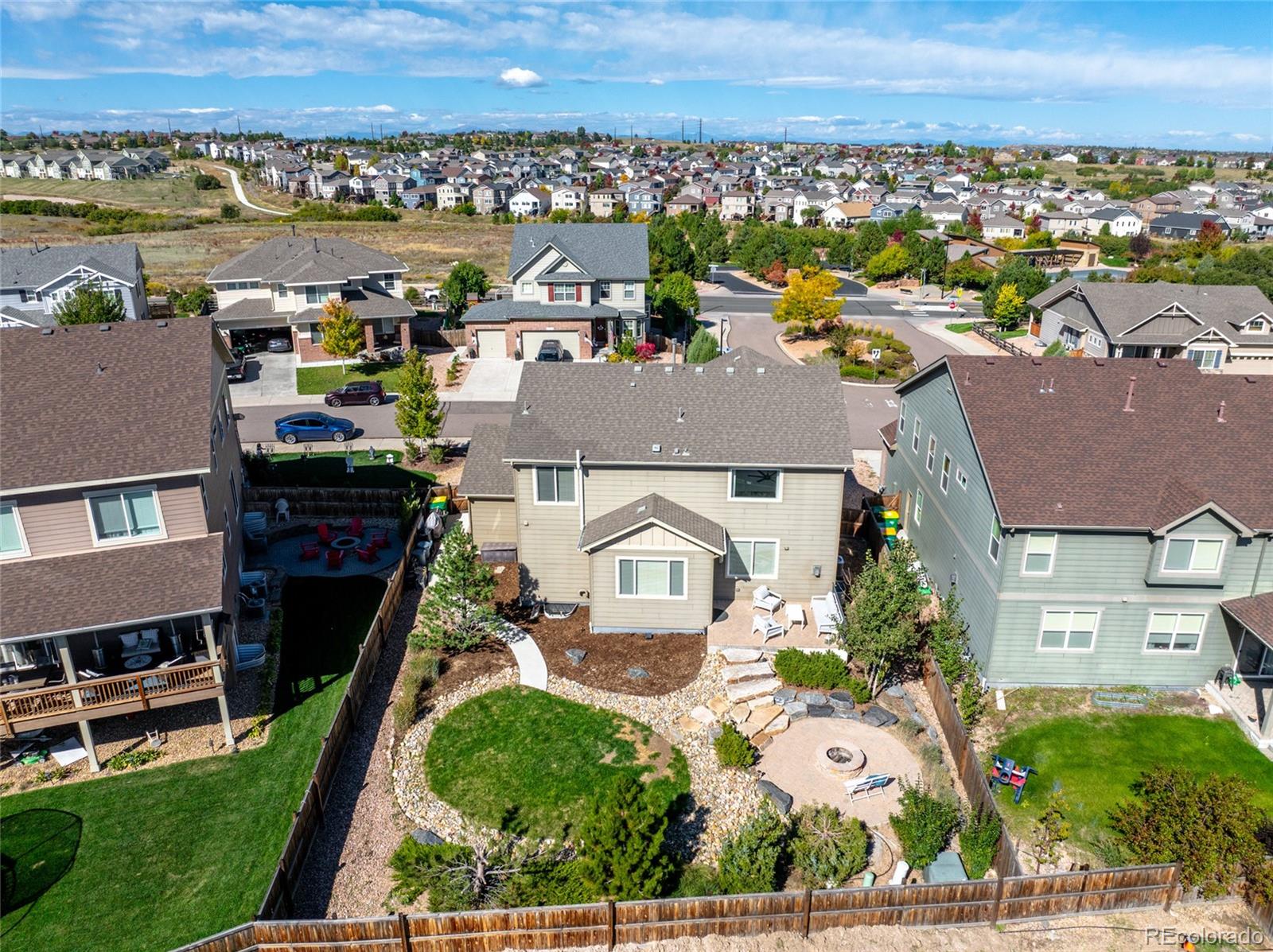 1444 Sidewinder Circle Castle Rock, CO 80108 - Photo 31 of 40 an aerial view of a house with a garden