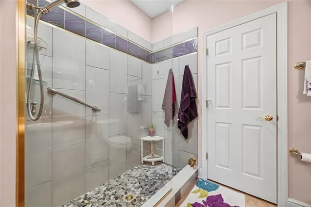 a walk in closet and bathroom