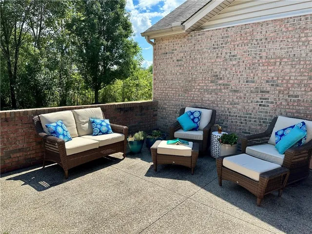 a outdoor living space with furniture and a couch