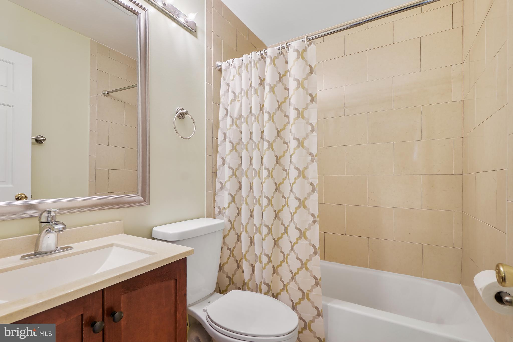 9412 Kilbride Court Perry Hall, MD 21128 - Photo 23 of 52 a bathroom with a sink toilet and shower