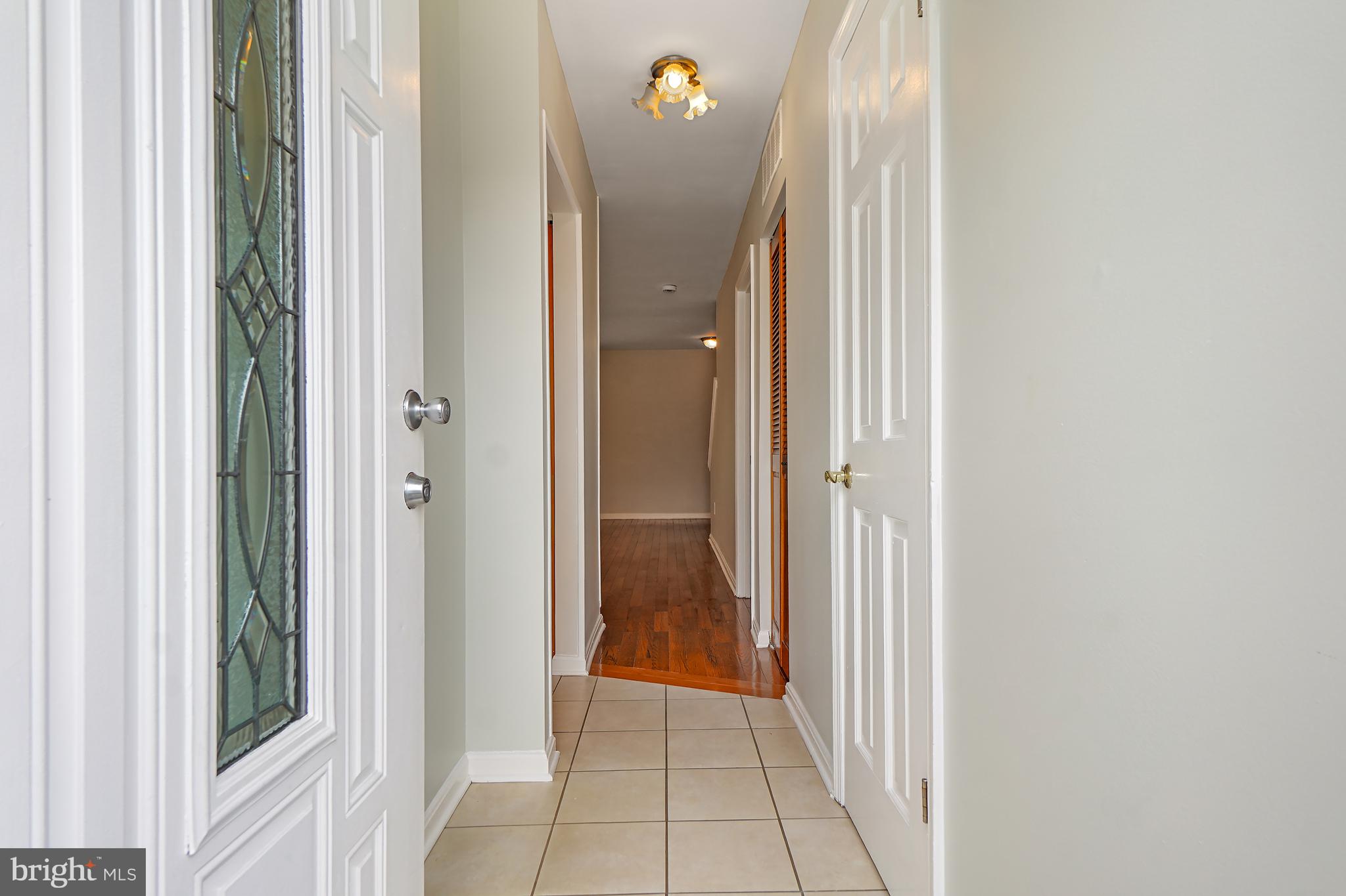 9412 Kilbride Court Perry Hall, MD 21128 - Photo 5 of 52 a view of a bathroom from a corridor
