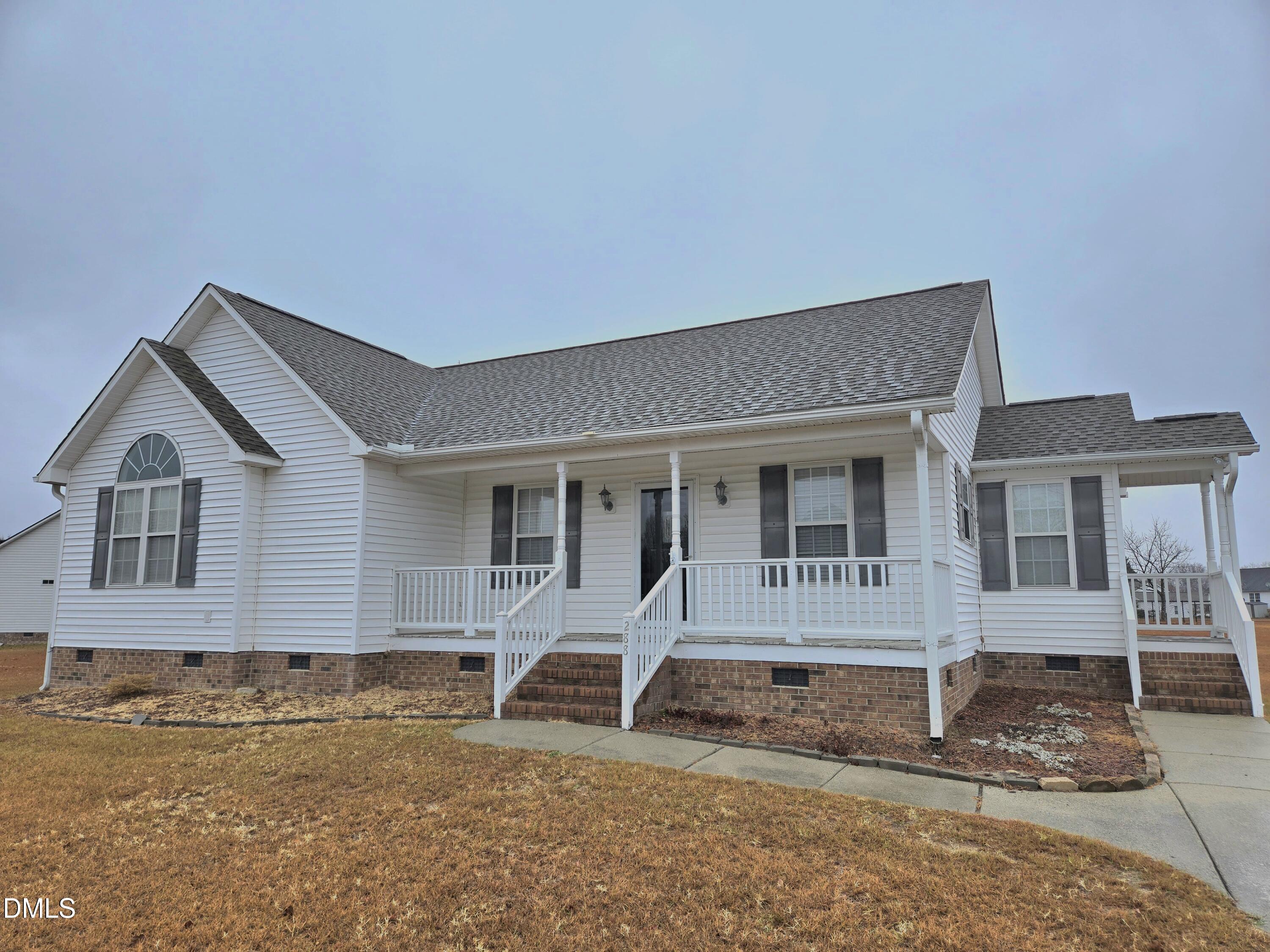 288 Rosa Circle Willow Spring, NC 27592 - Photo 1 of 19 a front view of a house with garden
