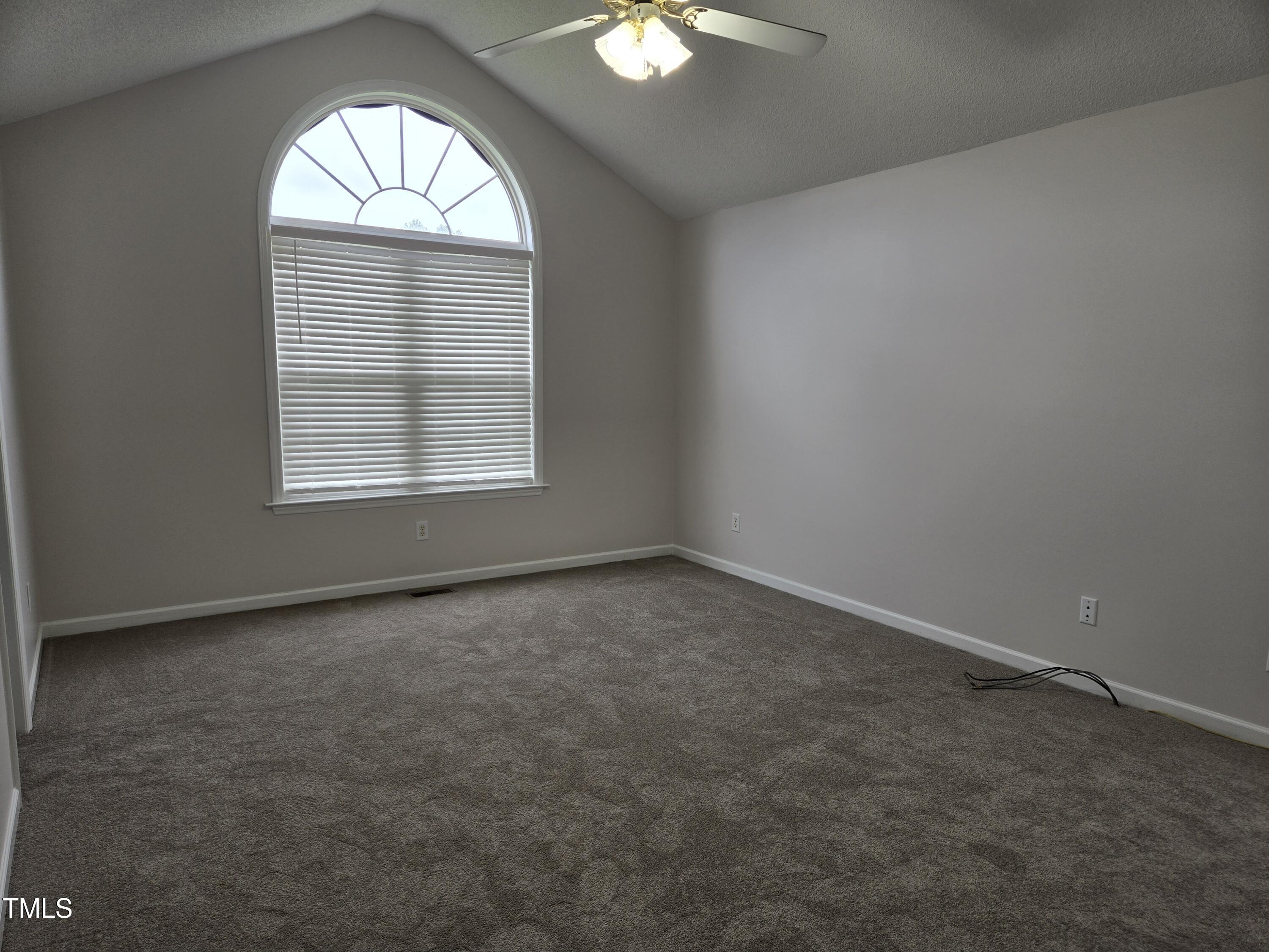288 Rosa Circle Willow Spring, NC 27592 - Photo 13 of 19 an empty room with a window
