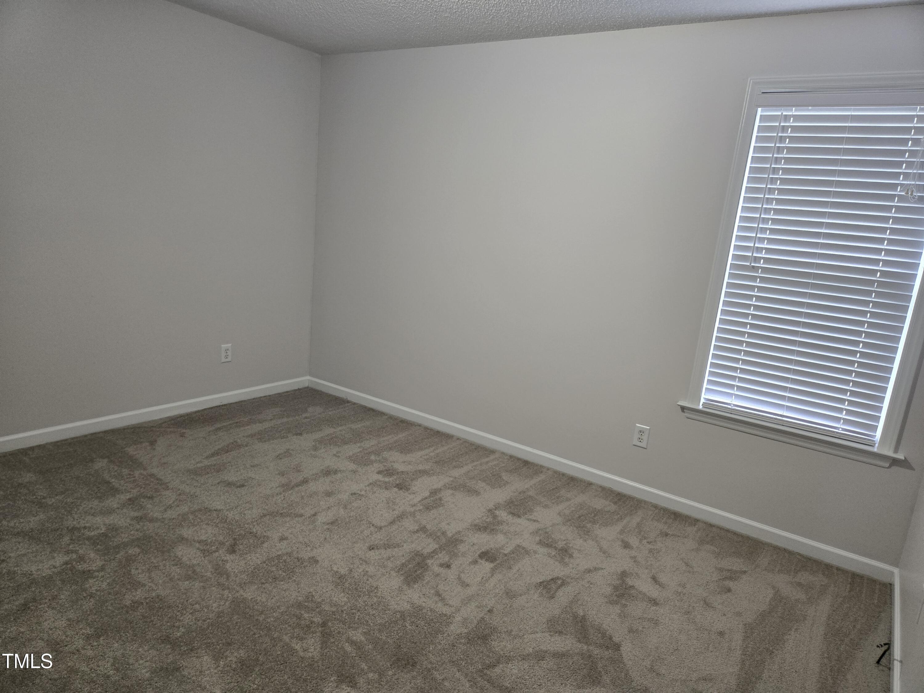 288 Rosa Circle Willow Spring, NC 27592 - Photo 16 of 19 an empty room with a window