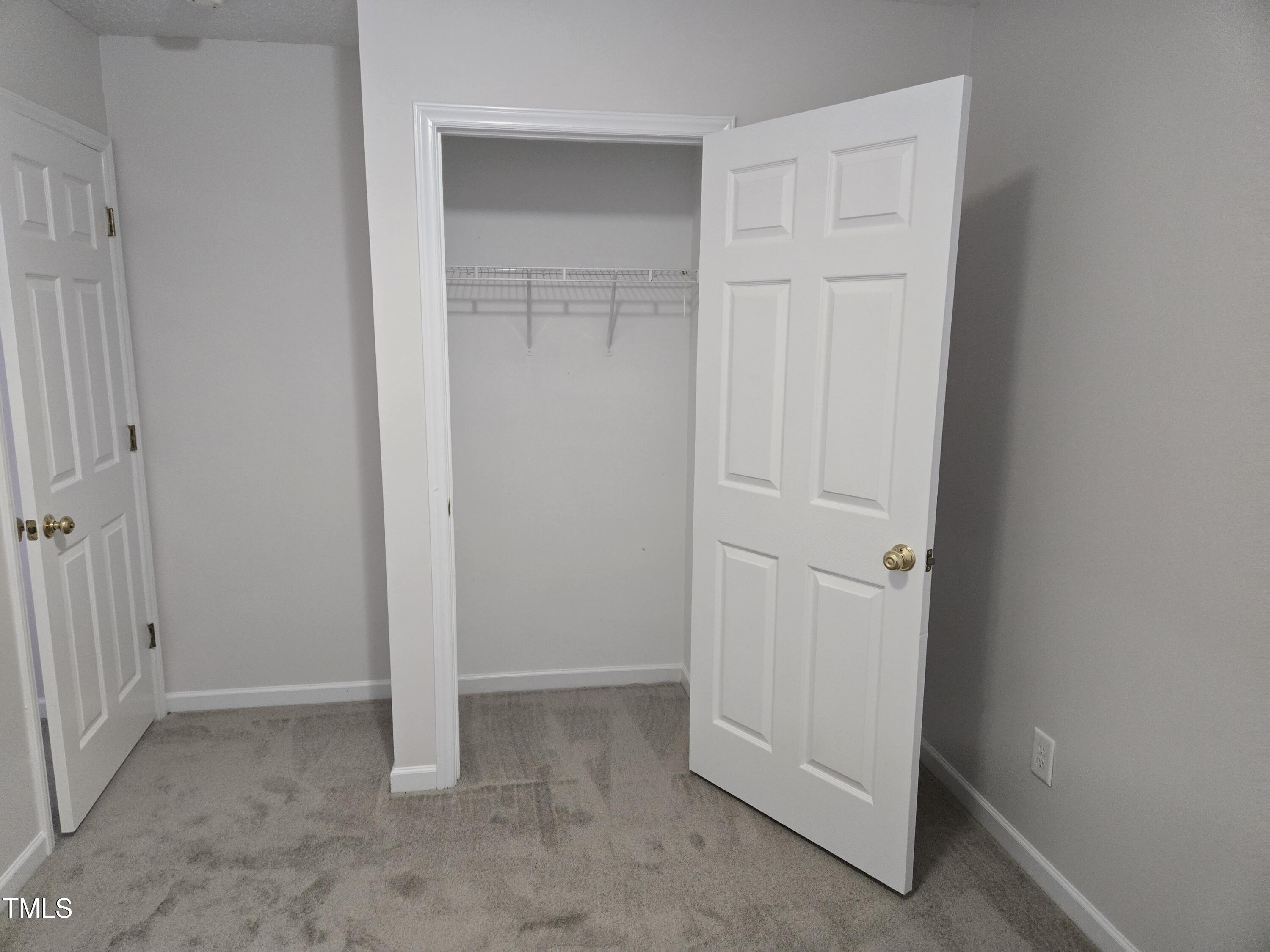 288 Rosa Circle Willow Spring, NC 27592 - Photo 18 of 19 an empty room with closet area