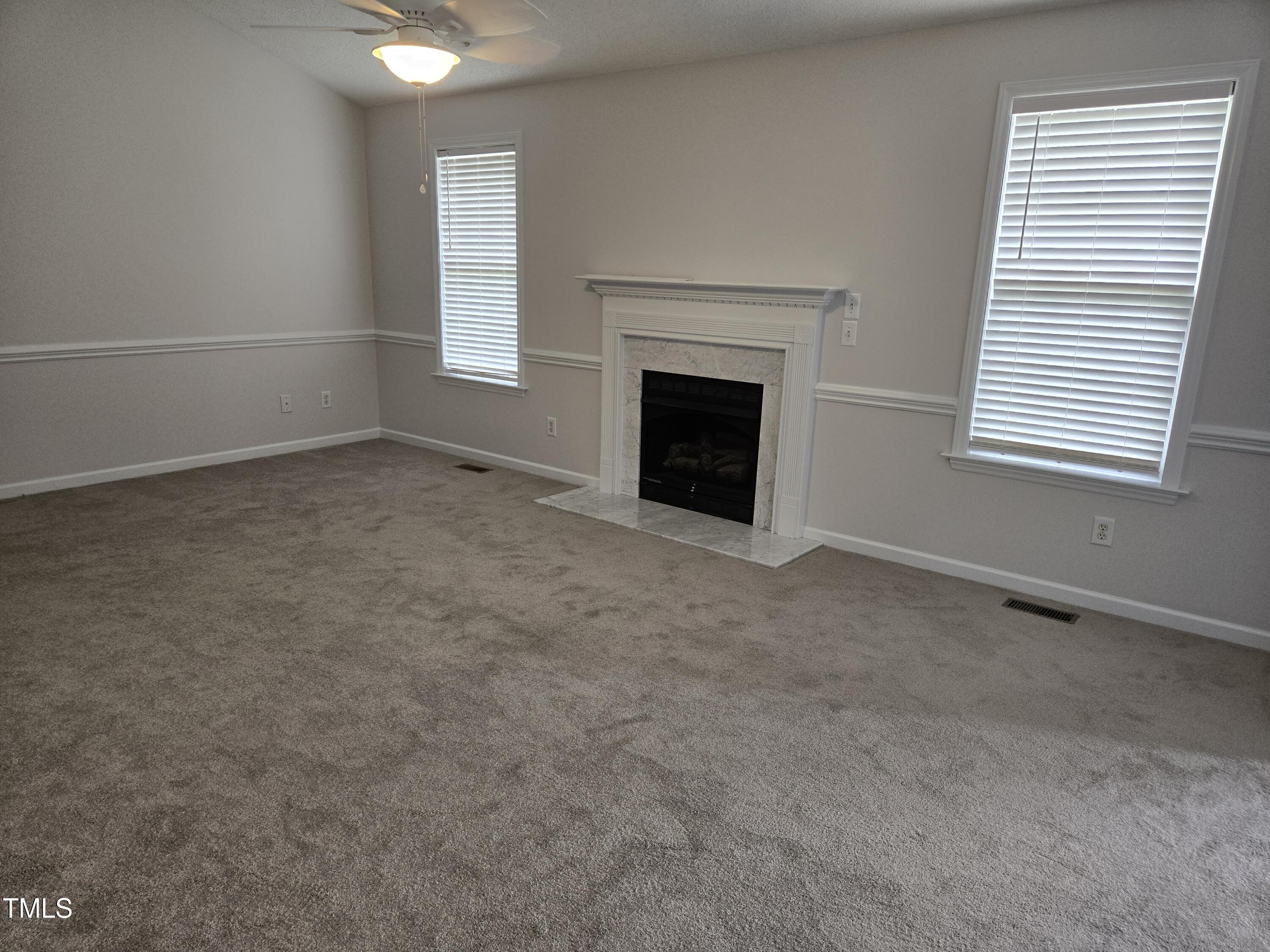 288 Rosa Circle Willow Spring, NC 27592 - Photo 9 of 19 an empty room with windows