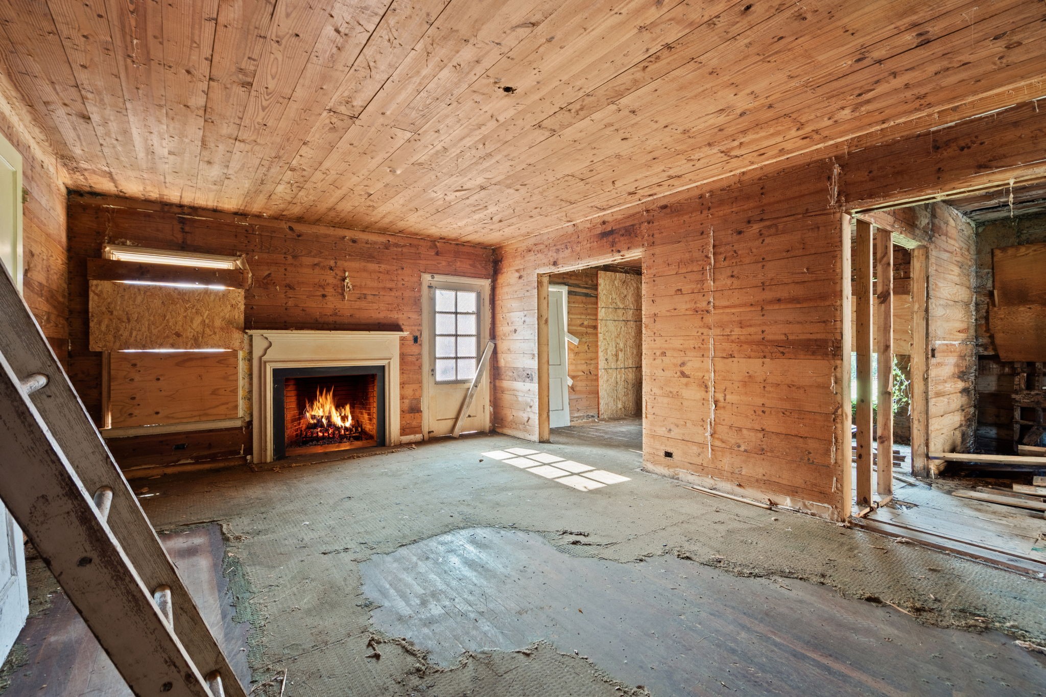 3338 Wichita Street Houston, TX 77004 - Photo 7 of 19 a view of an empty room with a fireplace