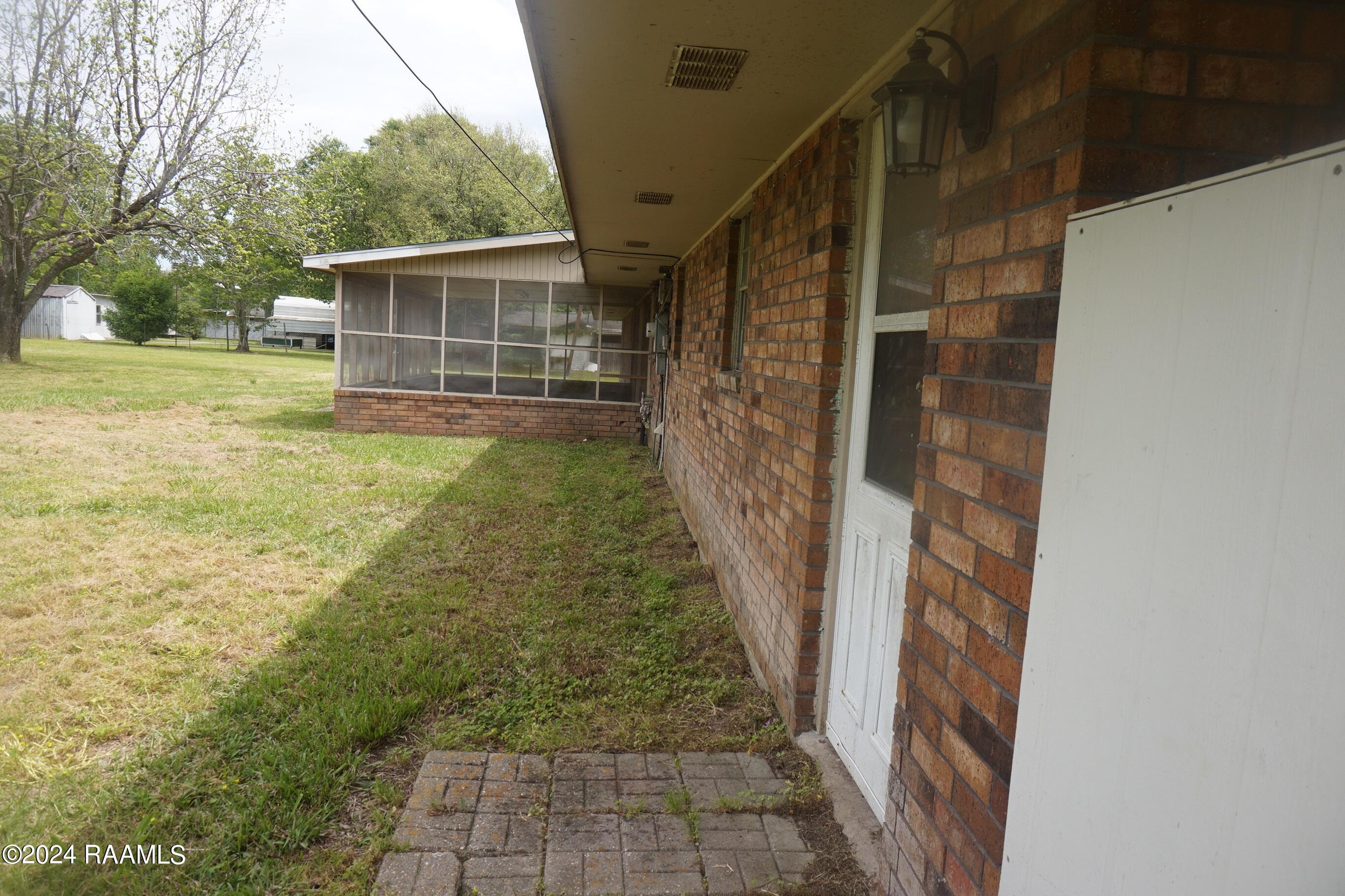 215 Soileau Road Eunice, LA 70535 - Photo 2 of 14 215 soileau back 0406