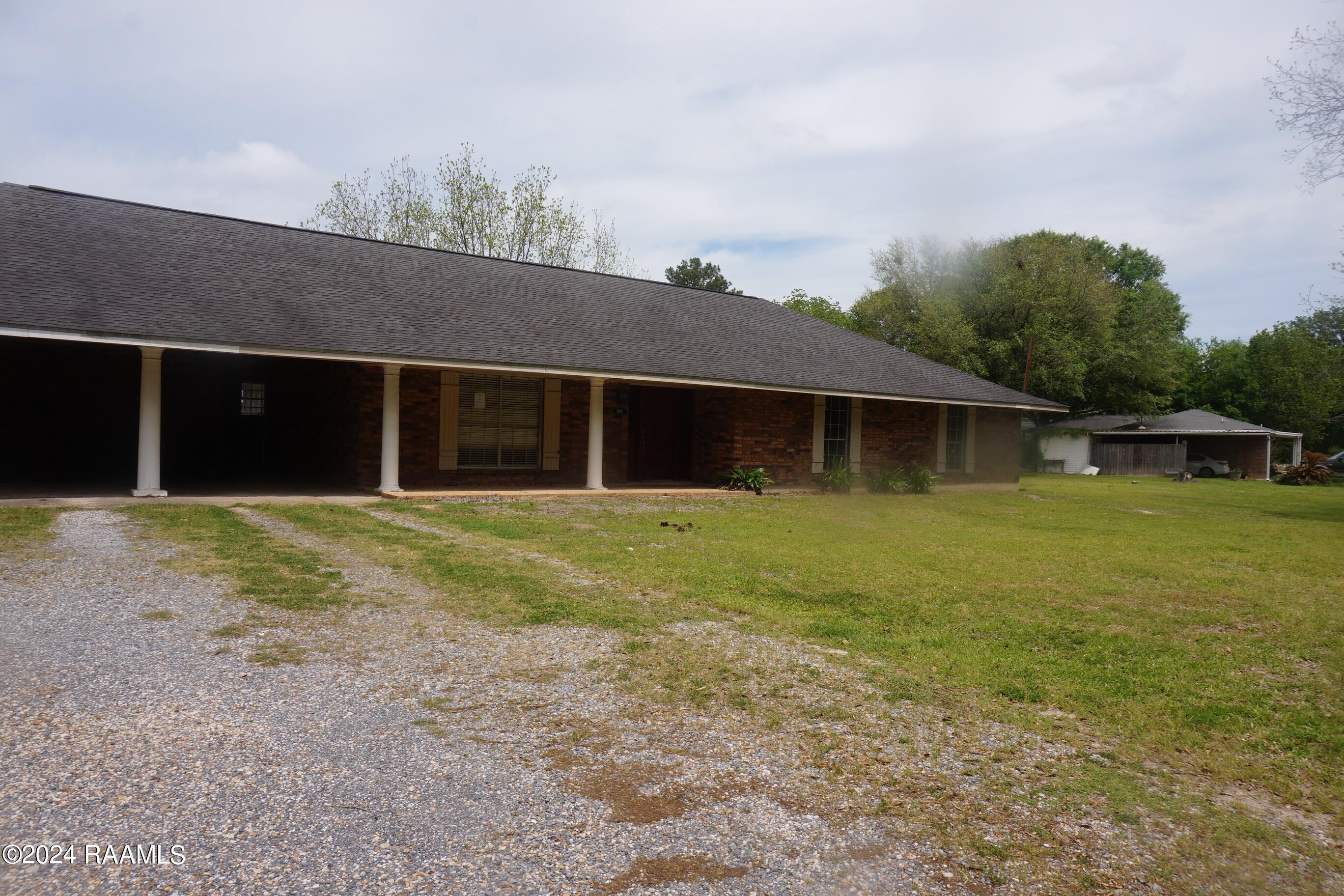 215 Soileau Road Eunice, LA 70535 - Photo 3 of 14 215 soileau front angled 1 0406