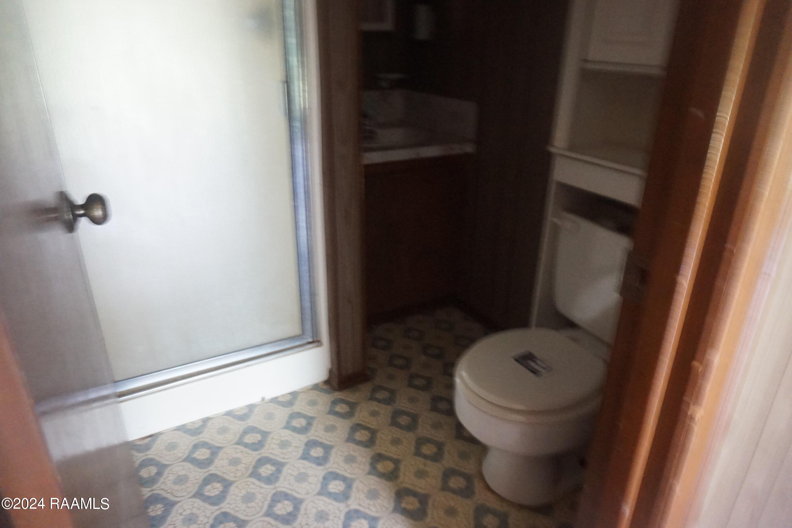 215 Soileau Road Eunice, LA 70535 - Photo 4 of 14 215 soileau bath 1 0406