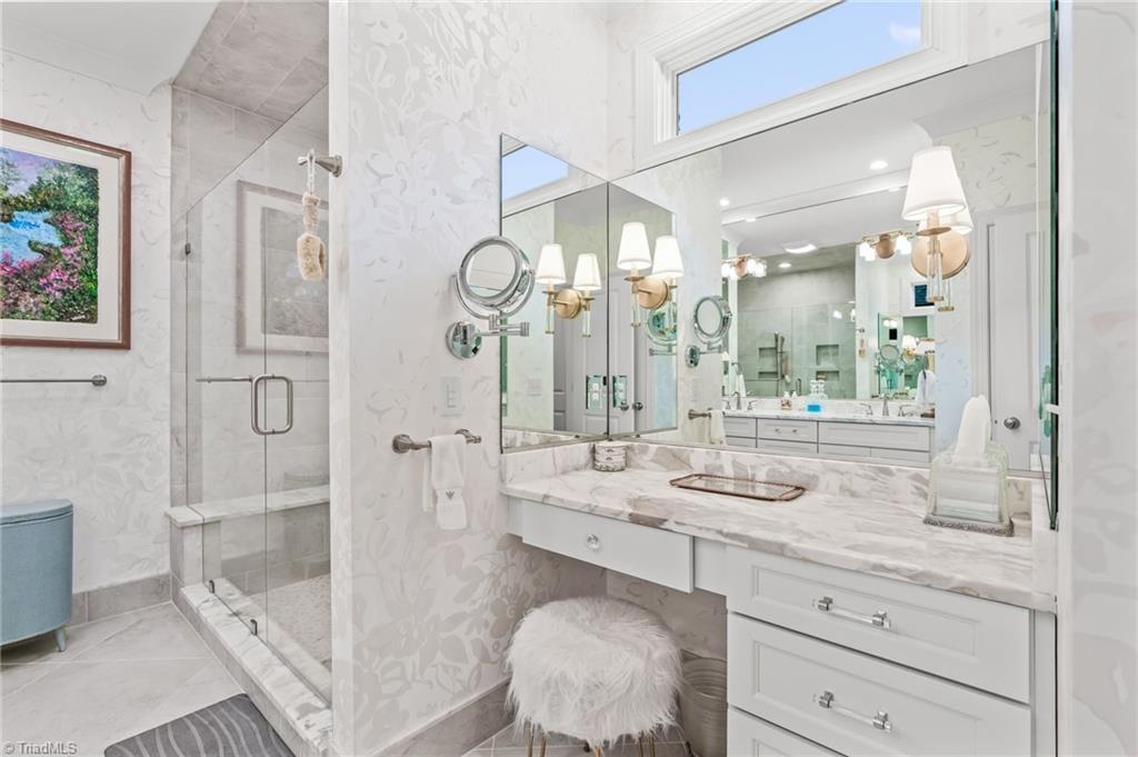 1645 Linton Court High Point, NC 27262 - Photo 24 of 50 Large walk-in shower with floor to ceiling tile.