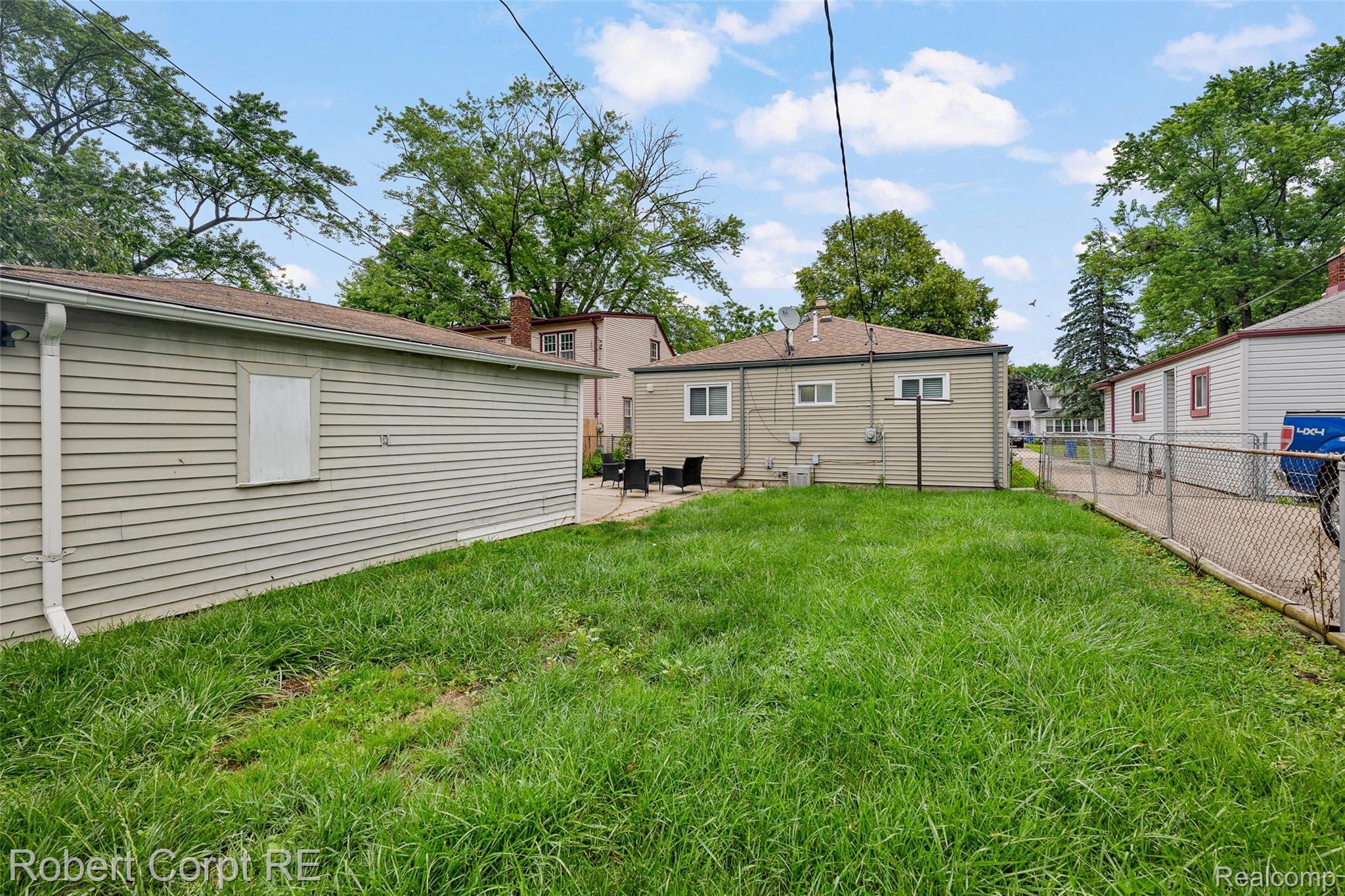 4772 Harding Street Dearborn Heights, MI 48125 - Photo 21 of 22 Back of property with a patio area
