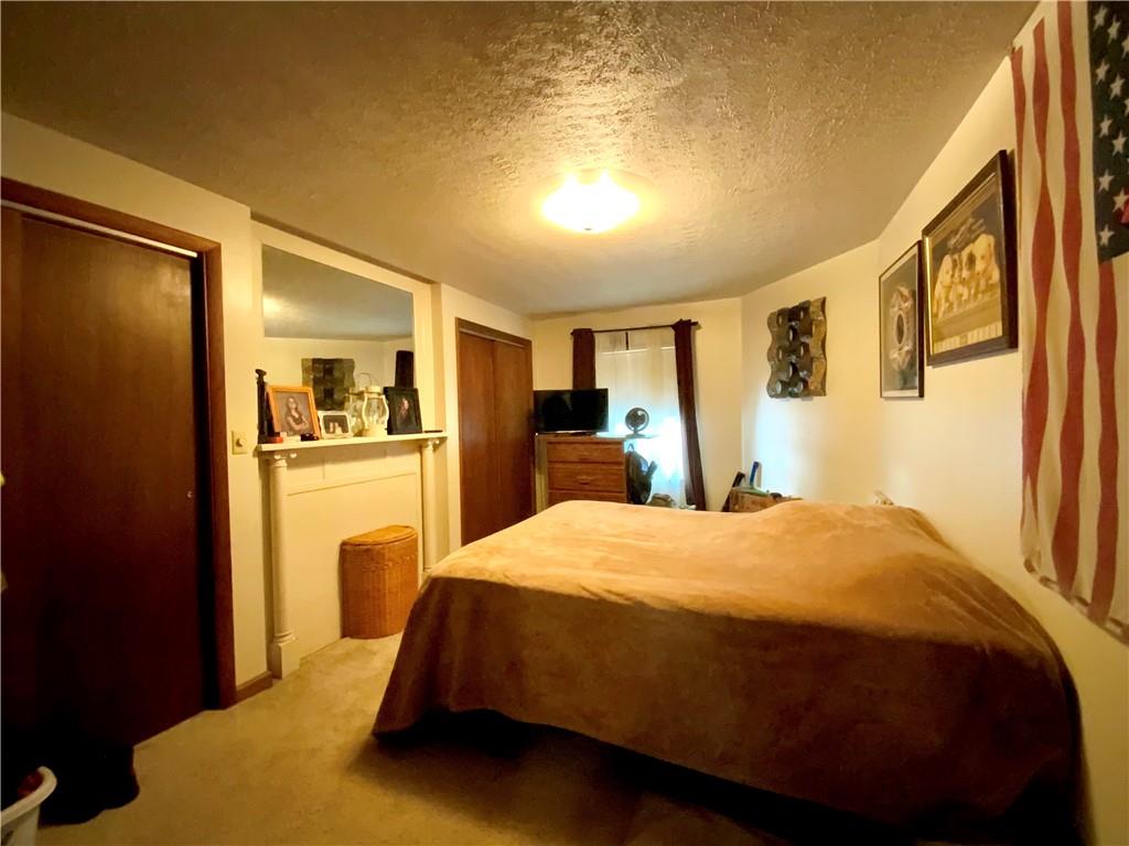 323 Prestley Road Bridgeville, PA 15017 - Photo 11 of 22 1st flr bedroom