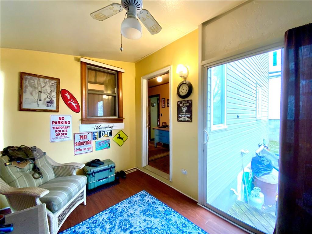 323 Prestley Road Bridgeville, PA 15017 - Photo 7 of 22 Sun room on the first floor
