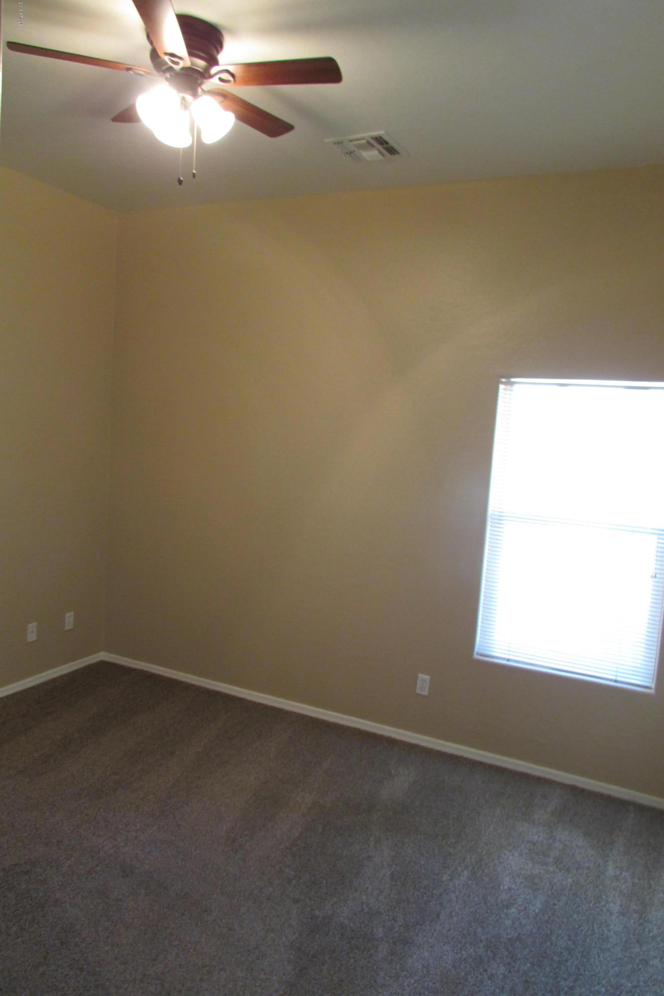716 East Ranch Road Gilbert, AZ 85296 - Photo 10 of 22 an empty room with a window