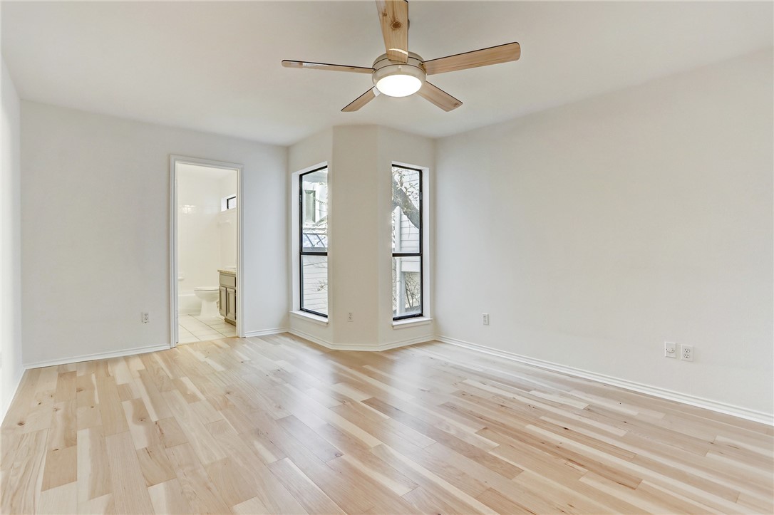 2507 Quarry Road, Unit D Austin, TX 78703 - Photo 5 of 9 wooden floor in an empty room