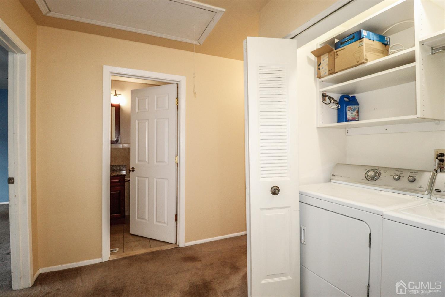 5602 Hana Road Edison, NJ 08817 - Photo 14 of 29 a utility room with dryer and washer