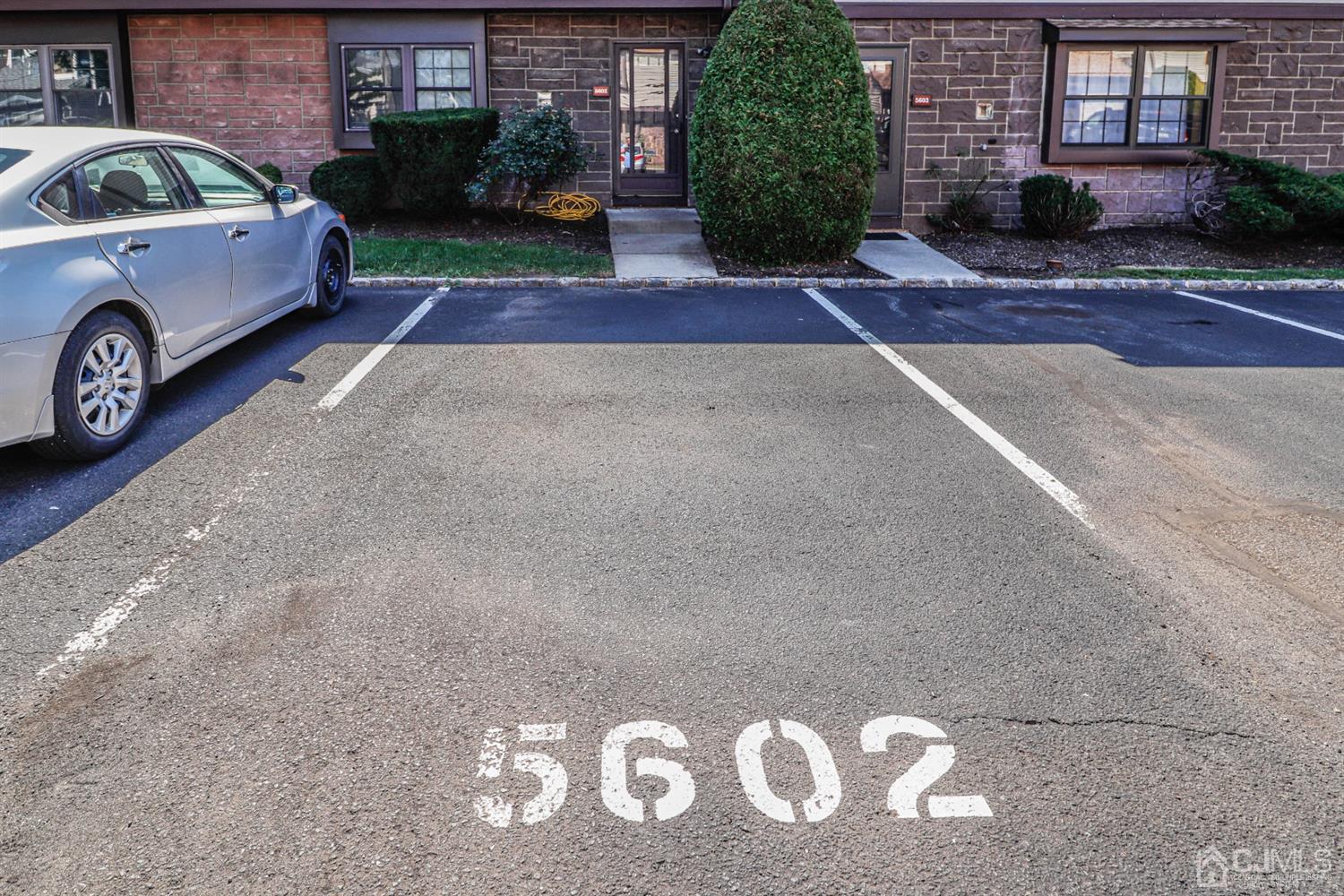 5602 Hana Road Edison, NJ 08817 - Photo 7 of 29 a front view of a house with parking space