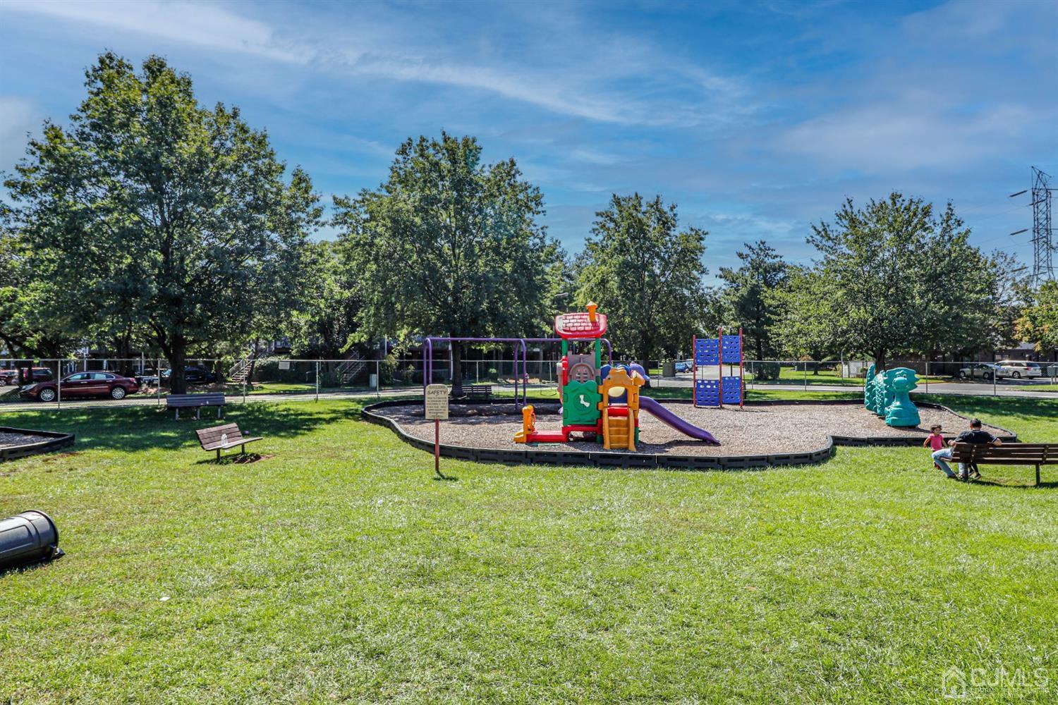 5602 Hana Road Edison, NJ 08817 - Photo 10 of 29 a view of a swimming pool with sitting area and slide