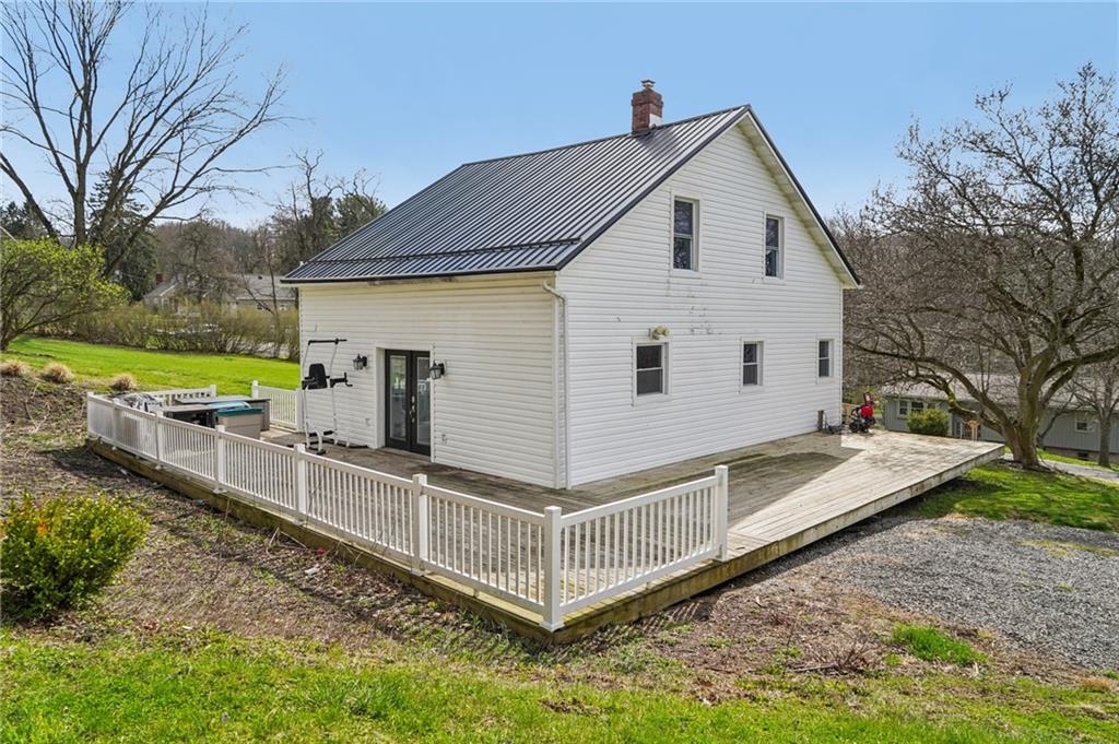 6012 Cunningham Road Gibsonia, PA 15044 - Photo 21 of 26 a view of a house with backyard and trees