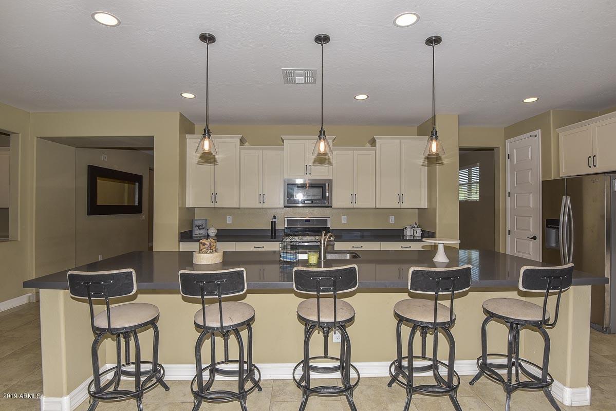 20499 West Stone Hill Road Buckeye, AZ 85396 - Photo 6 of 39 Kitchen Island2-ehlen