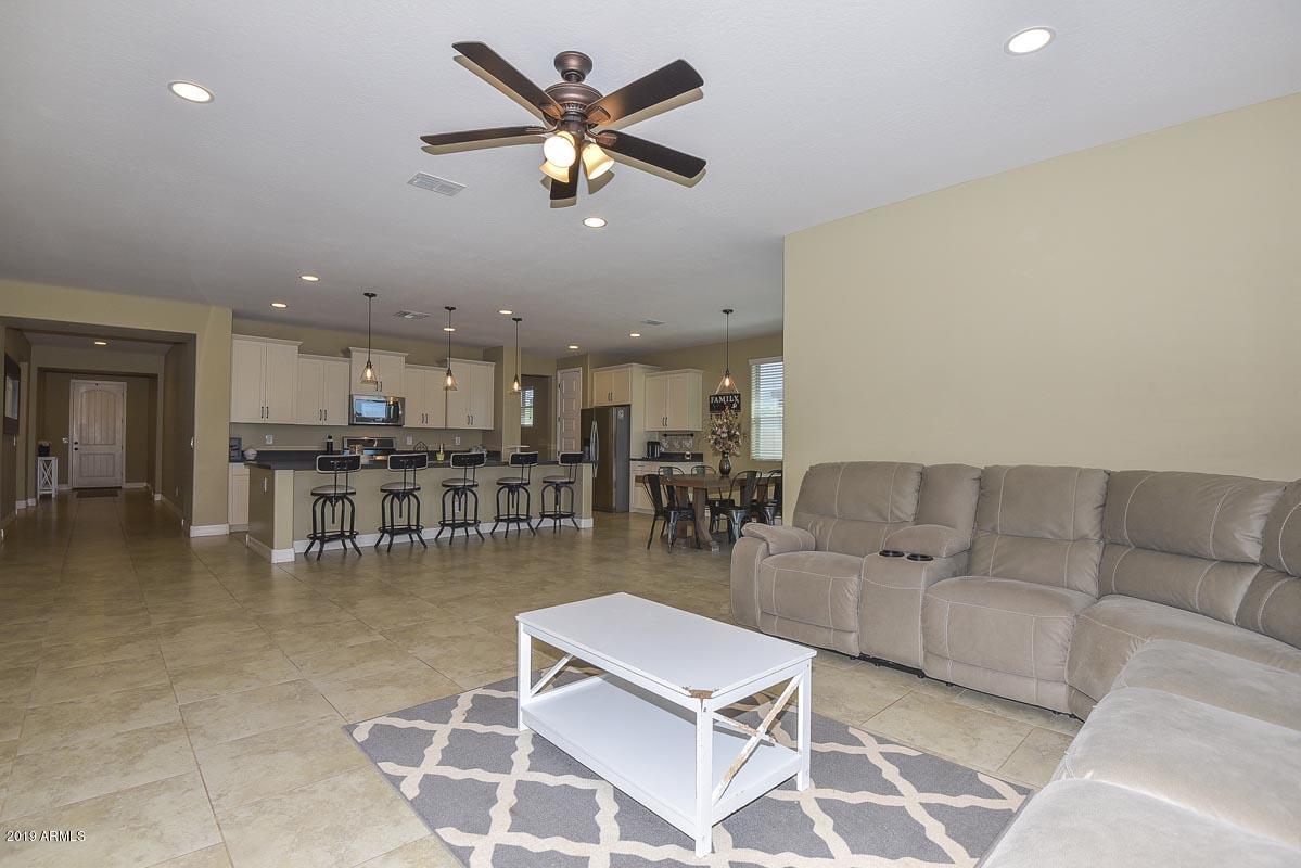 20499 West Stone Hill Road Buckeye, AZ 85396 - Photo 9 of 39 Great Room-Kitchen-ehlen