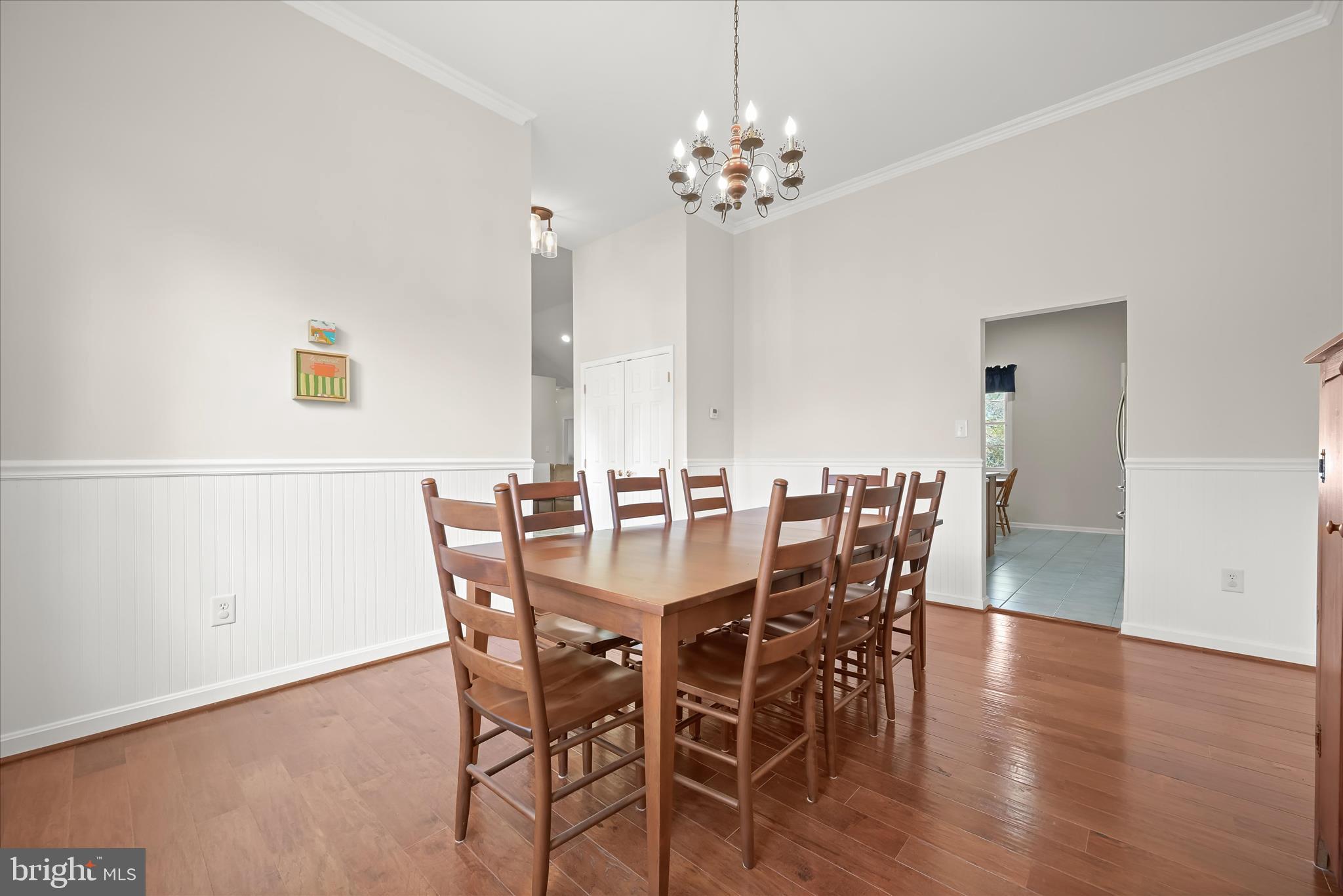 6735 Mink Hollow Road Highland, MD 20777 - Photo 13 of 58 a view of a dining room with furniture and wooden floor