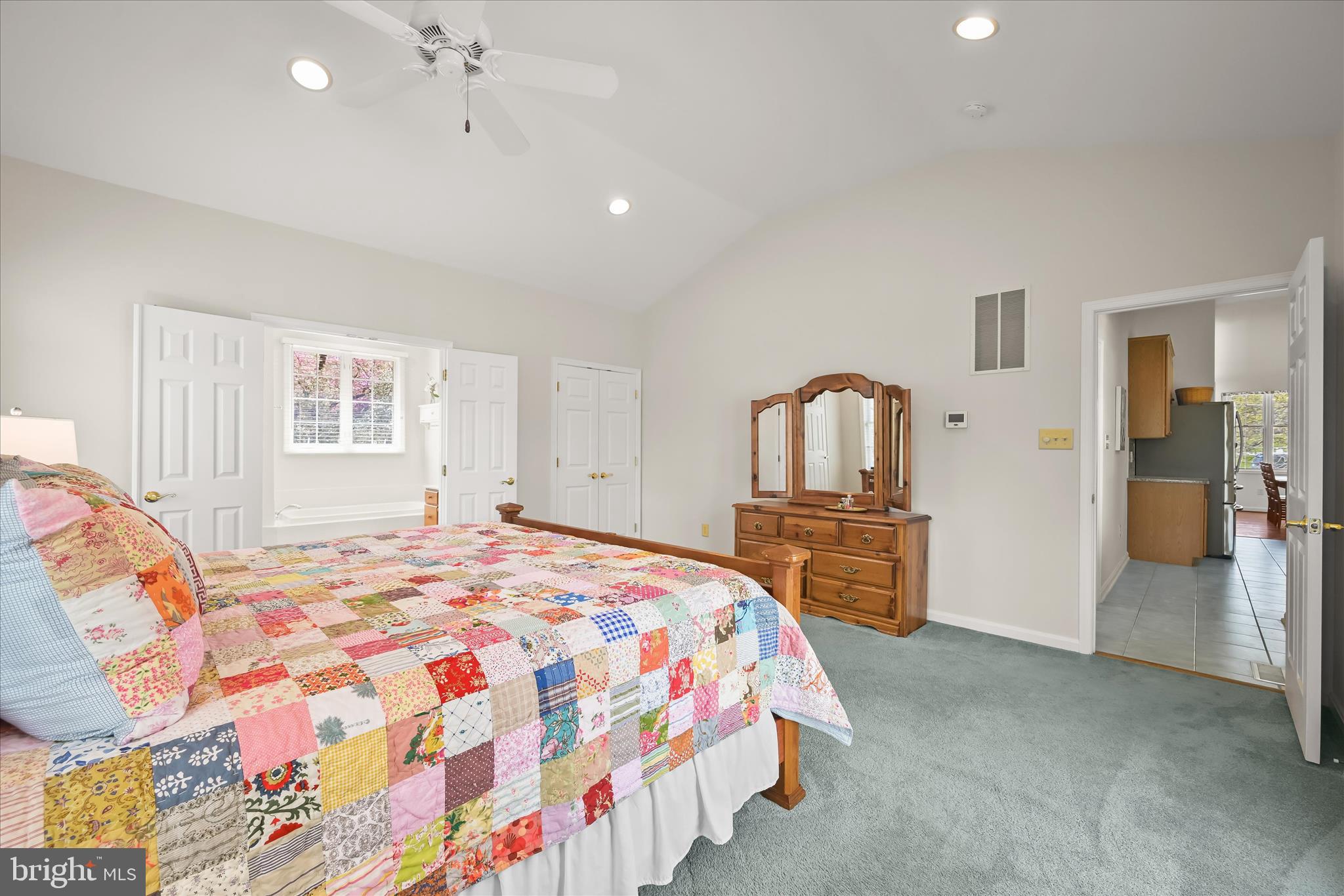 6735 Mink Hollow Road Highland, MD 20777 - Photo 23 of 58 a bedroom with a large bed and dresser