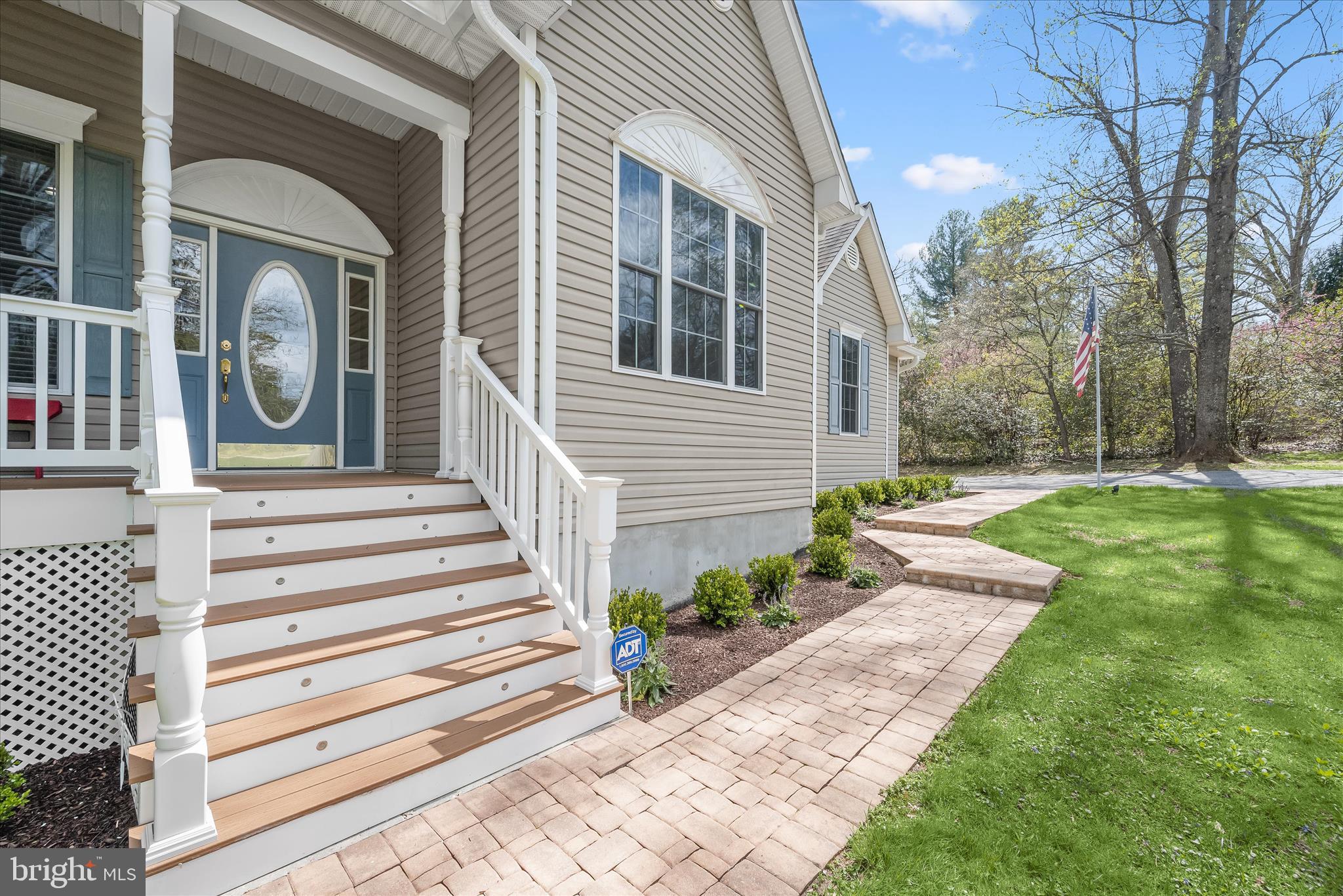 6735 Mink Hollow Road Highland, MD 20777 - Photo 3 of 58 a front view of a house with a yard