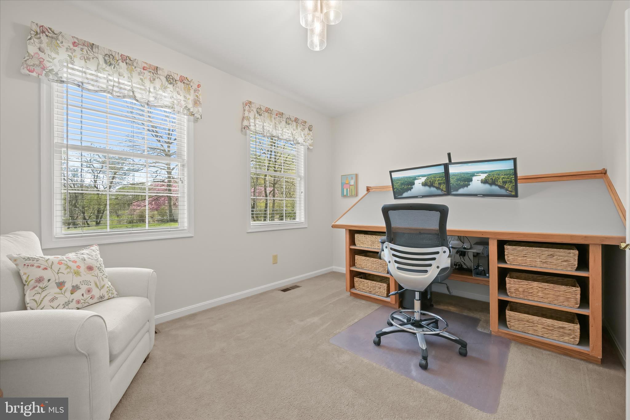 6735 Mink Hollow Road Highland, MD 20777 - Photo 32 of 58 a view of a workspace with furniture and a window