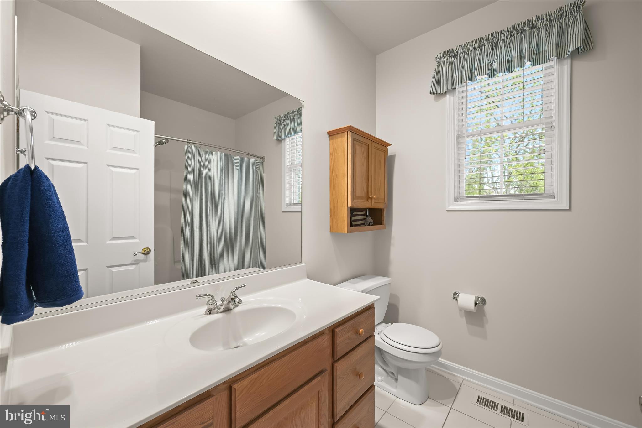 6735 Mink Hollow Road Highland, MD 20777 - Photo 34 of 58 a bathroom with a sink toilet and shower