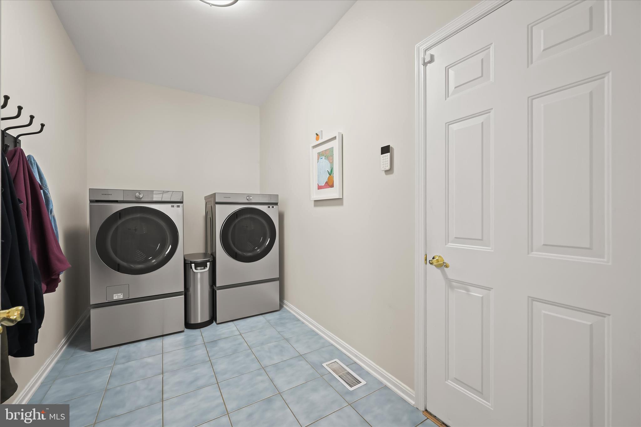 6735 Mink Hollow Road Highland, MD 20777 - Photo 36 of 58 a utility room with dryer and washer