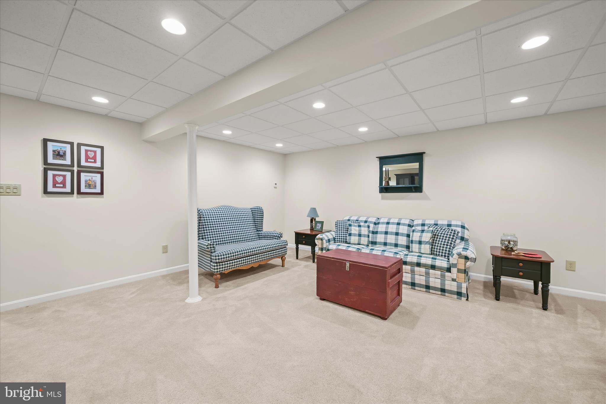 6735 Mink Hollow Road Highland, MD 20777 - Photo 38 of 58 a living room with furniture and a ceiling fan
