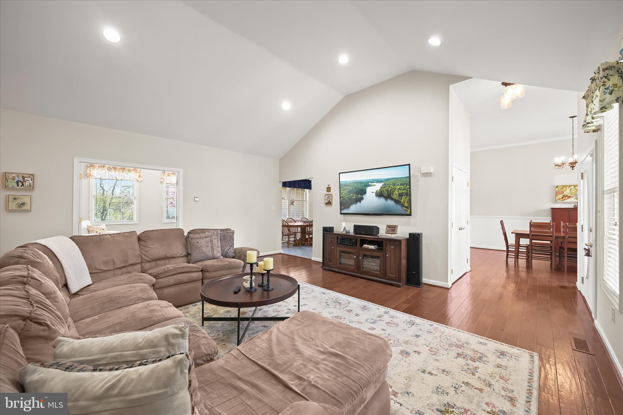 6735 Mink Hollow Road Highland, MD 20777 - Photo 7 of 58 a living room with furniture and a wooden floor