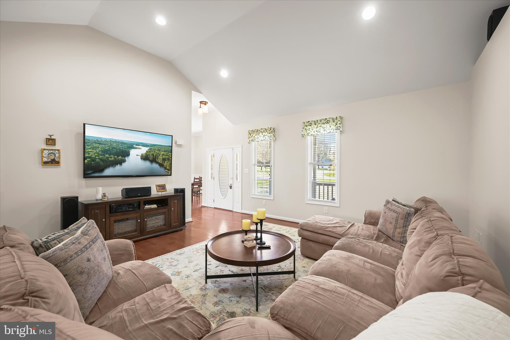 6735 Mink Hollow Road Highland, MD 20777 - Photo 8 of 58 a living room with furniture and a flat screen tv