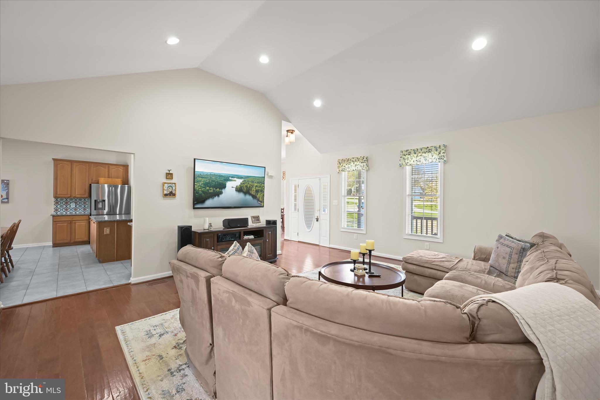 6735 Mink Hollow Road Highland, MD 20777 - Photo 9 of 58 a living room with furniture and a flat screen tv