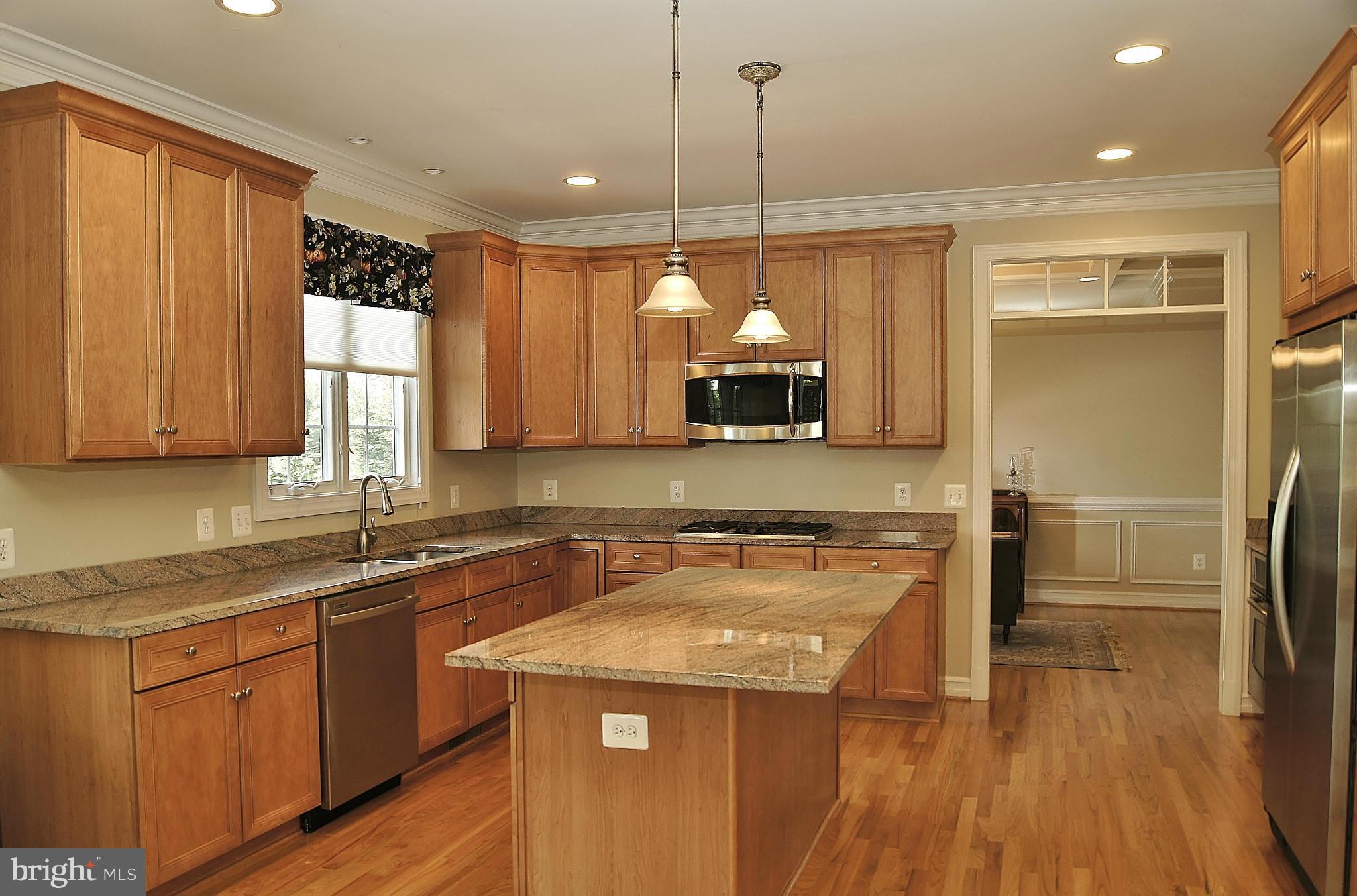 17201 Hardy Road Mount Airy, MD 21771 - Photo 5 of 27 Kitchen Features Custom Granite and Cabinets