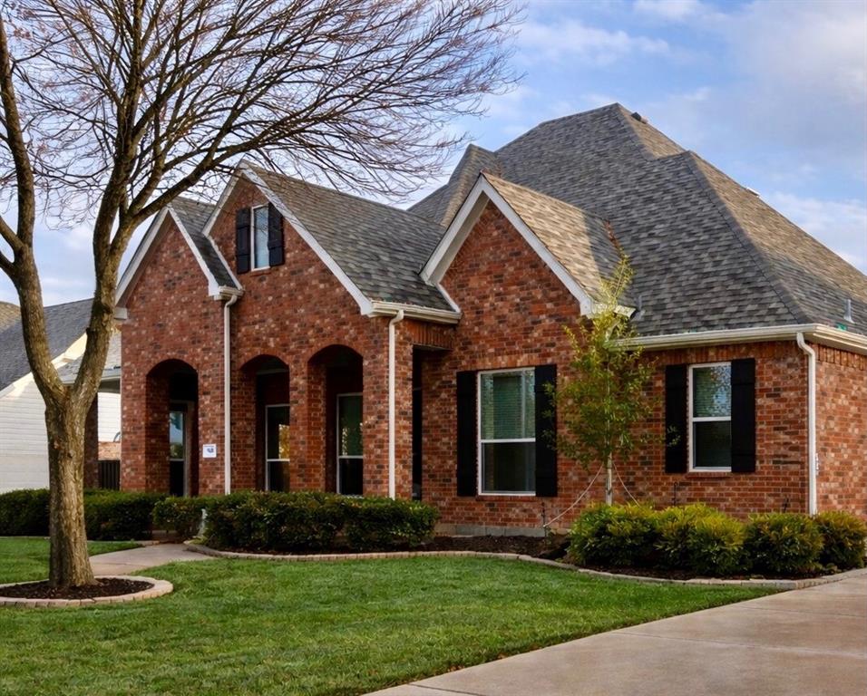 1906 Armstrong Drive Allen, TX 75002 - Photo 2 of 39 a front view of a house with a yard