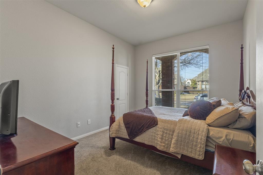 1906 Armstrong Drive Allen, TX 75002 - Photo 25 of 39 a bedroom with furniture and a window