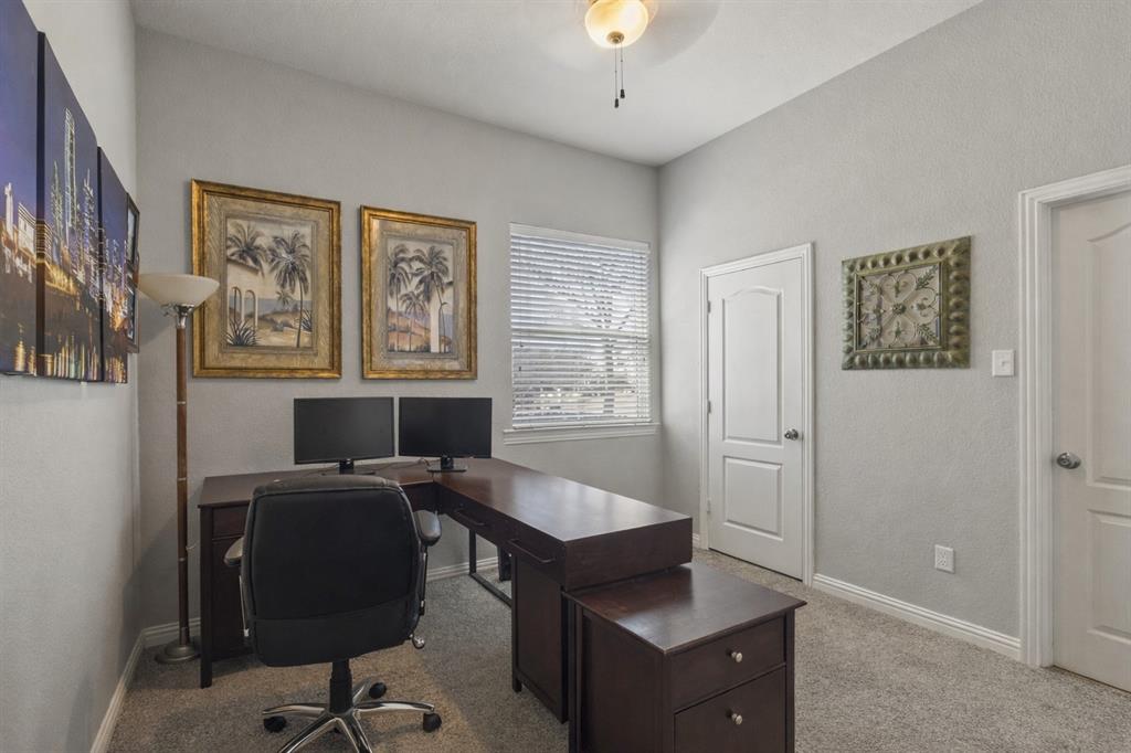 1906 Armstrong Drive Allen, TX 75002 - Photo 31 of 39 a view of a workspace with furniture and a window